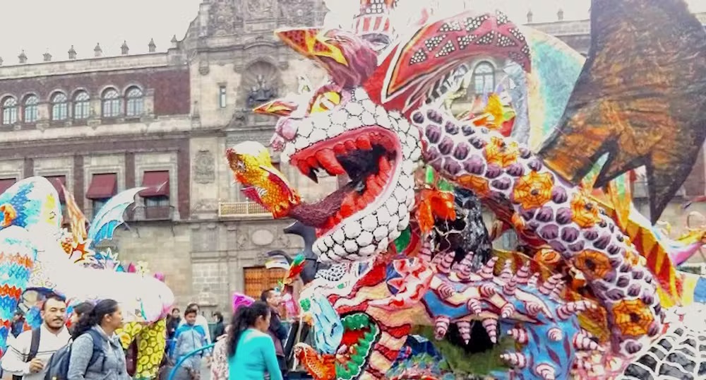 A Teacher's Guide to Día de los Muertos 3 Mexico City's Day of the Dead parade featuring colorful alebrijes