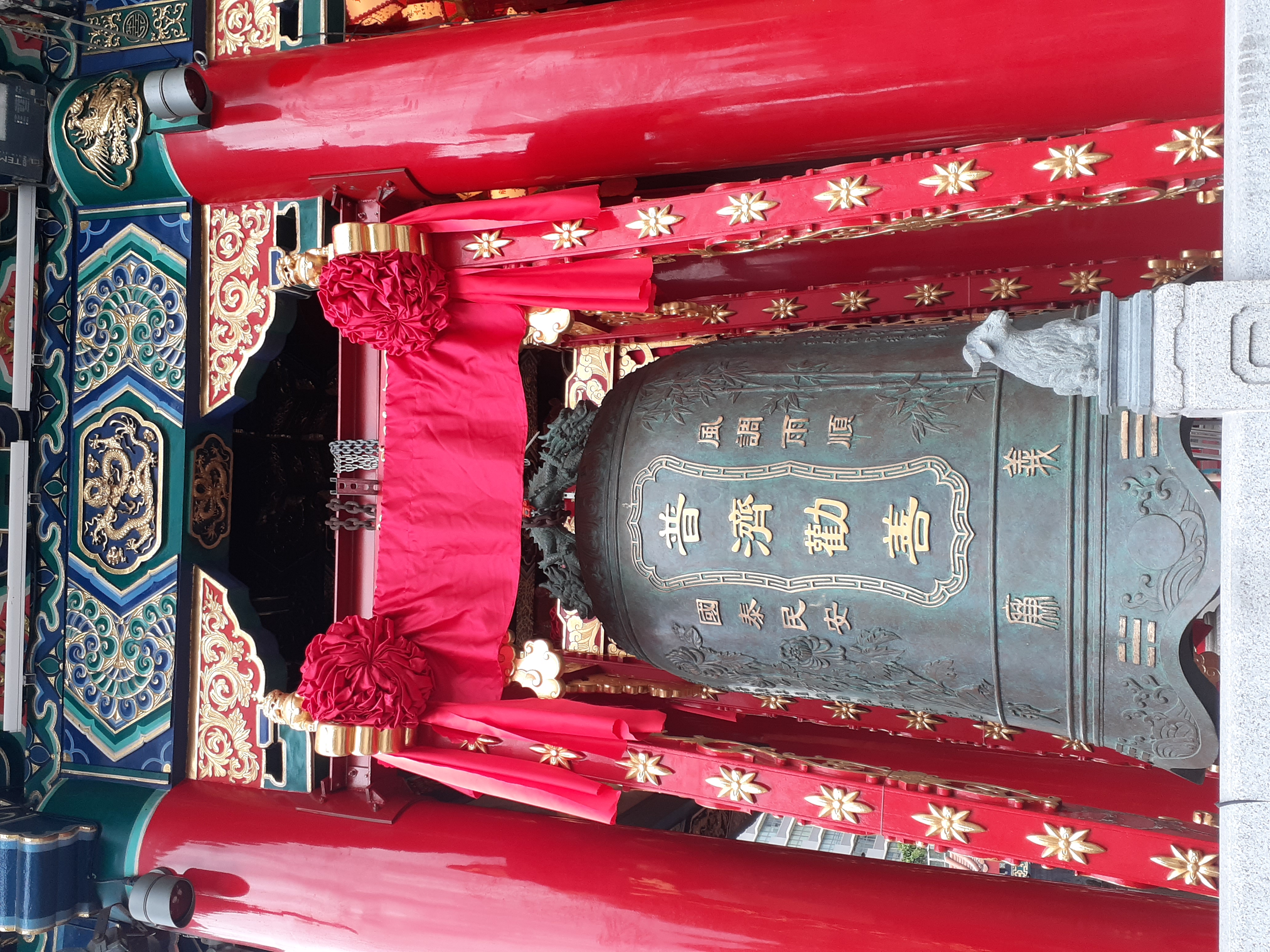 Detail of the ornate bell at Wong Tai Sin Temple in Hong Kong
