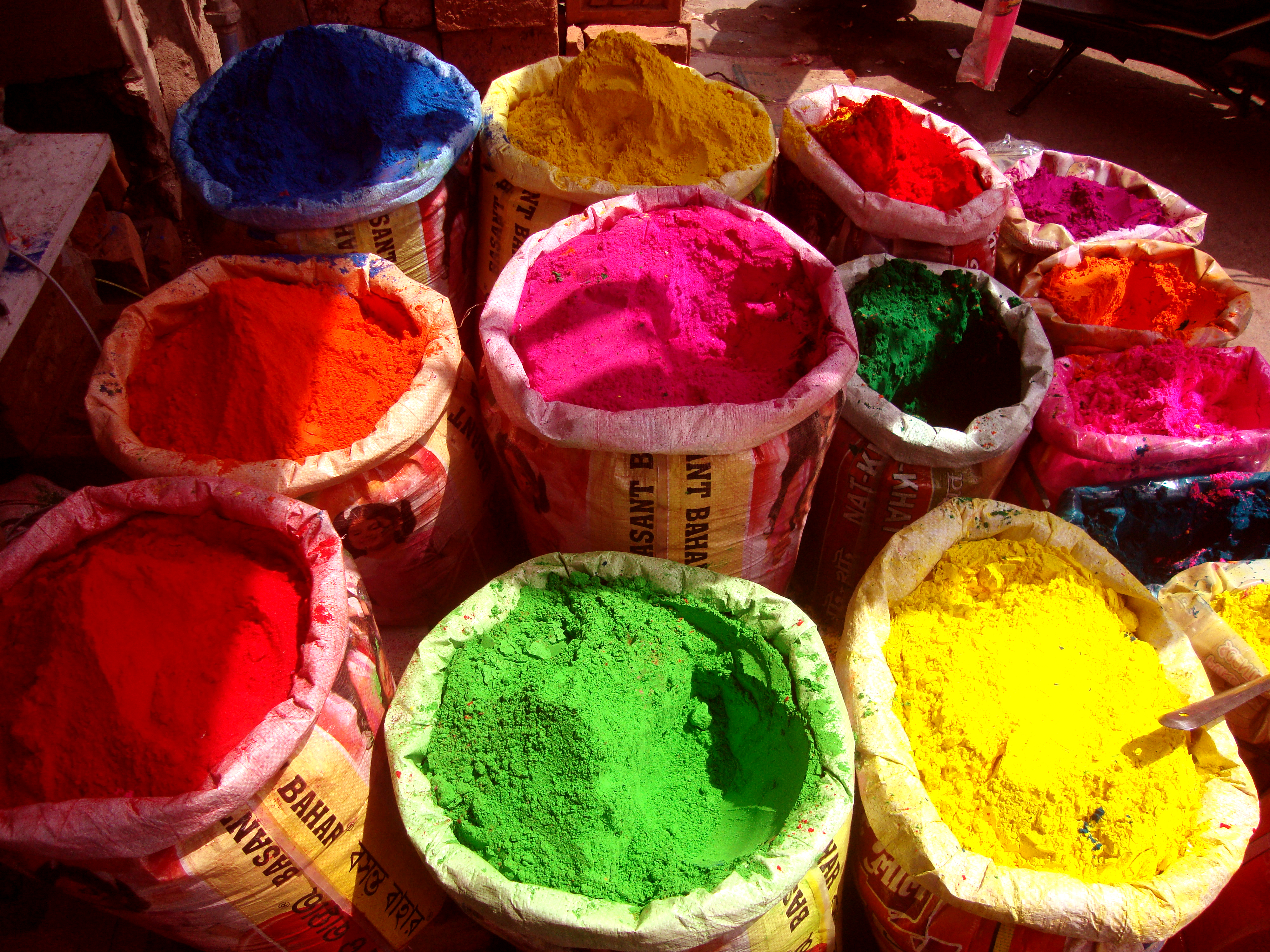 A vibrant shop selling gulal — the colored powders used in Holi celebrations