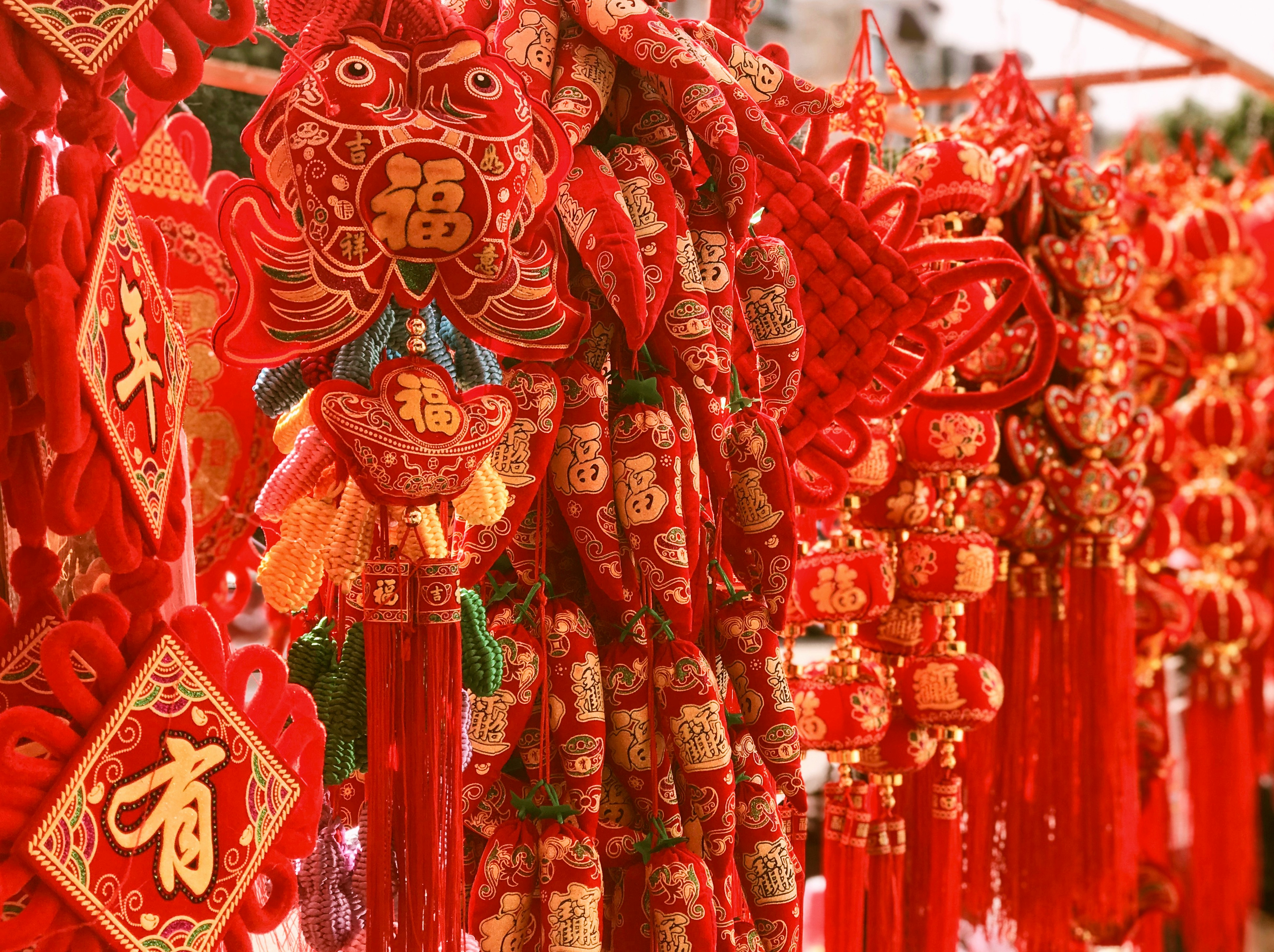 Traditional Chinese New Year decorations including red lanterns and spring couplets