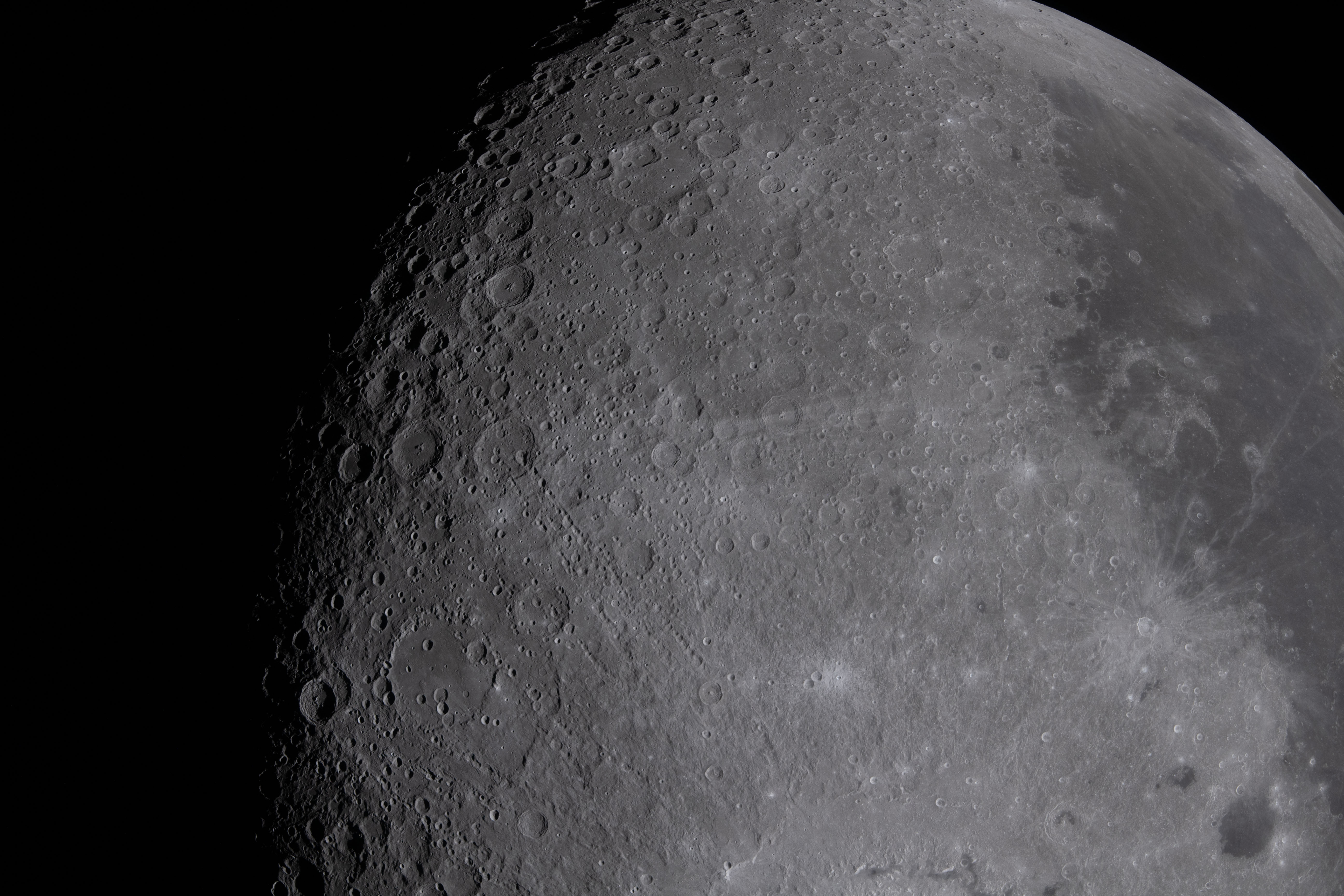 Multiple lunar landmarks visible including Ohm crater, Oceanus Procellarum, Grimaldi crater, and the Hertzsprung Basin — a range of geologic terrains