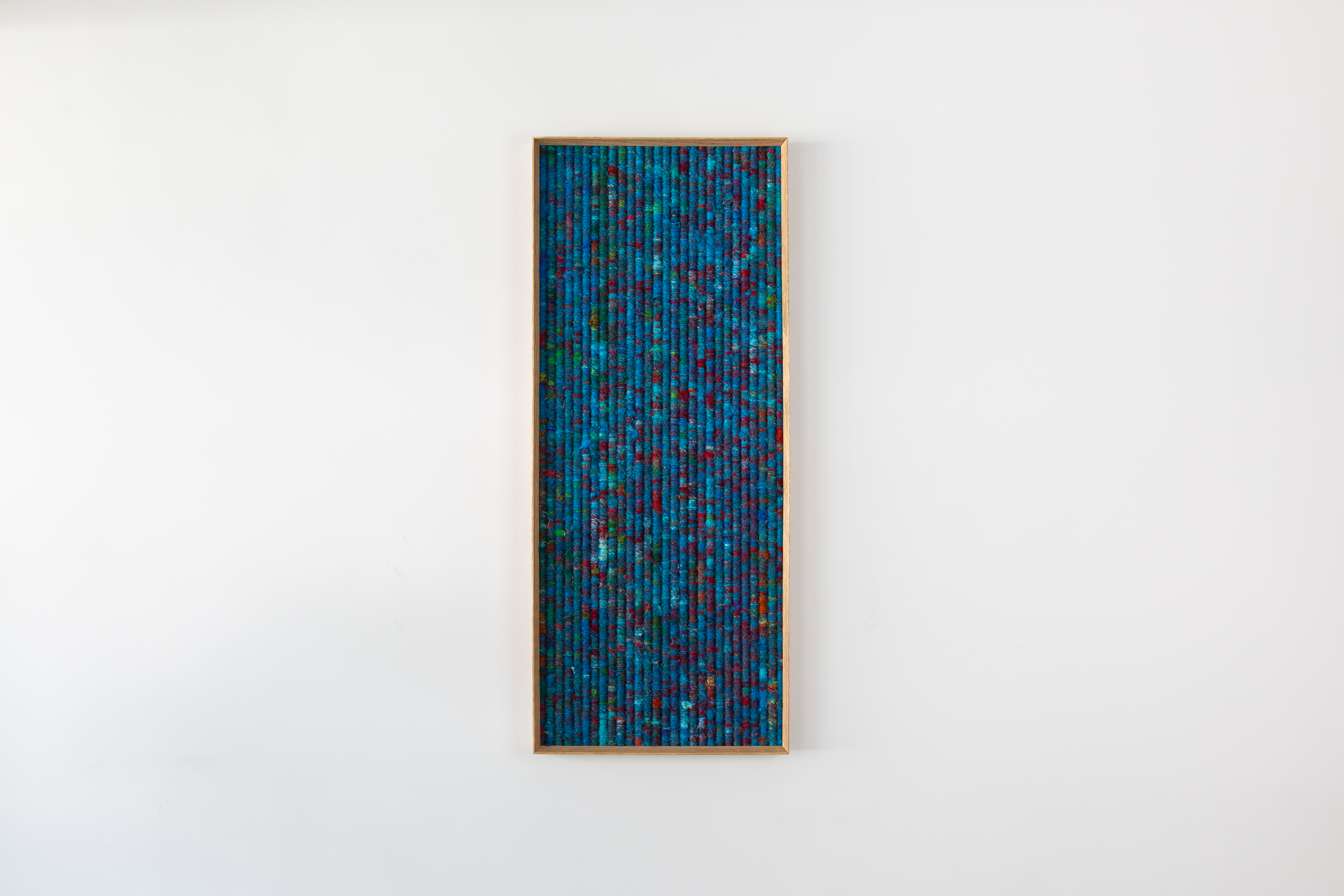 Two Rivers &mdash; tall woven artwork in vivid blue
