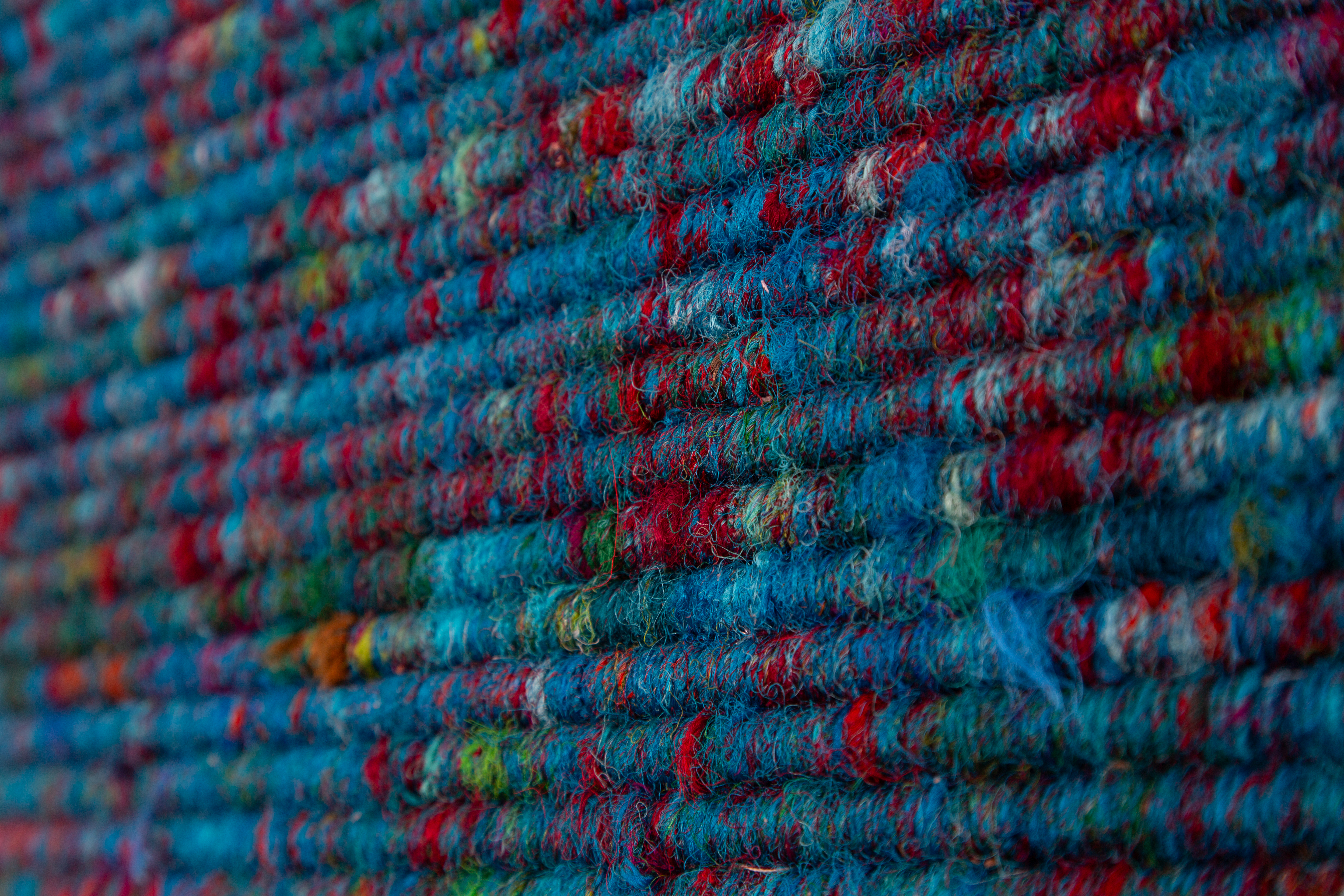 Close-up of Two Rivers &mdash; vivid blue and red threads