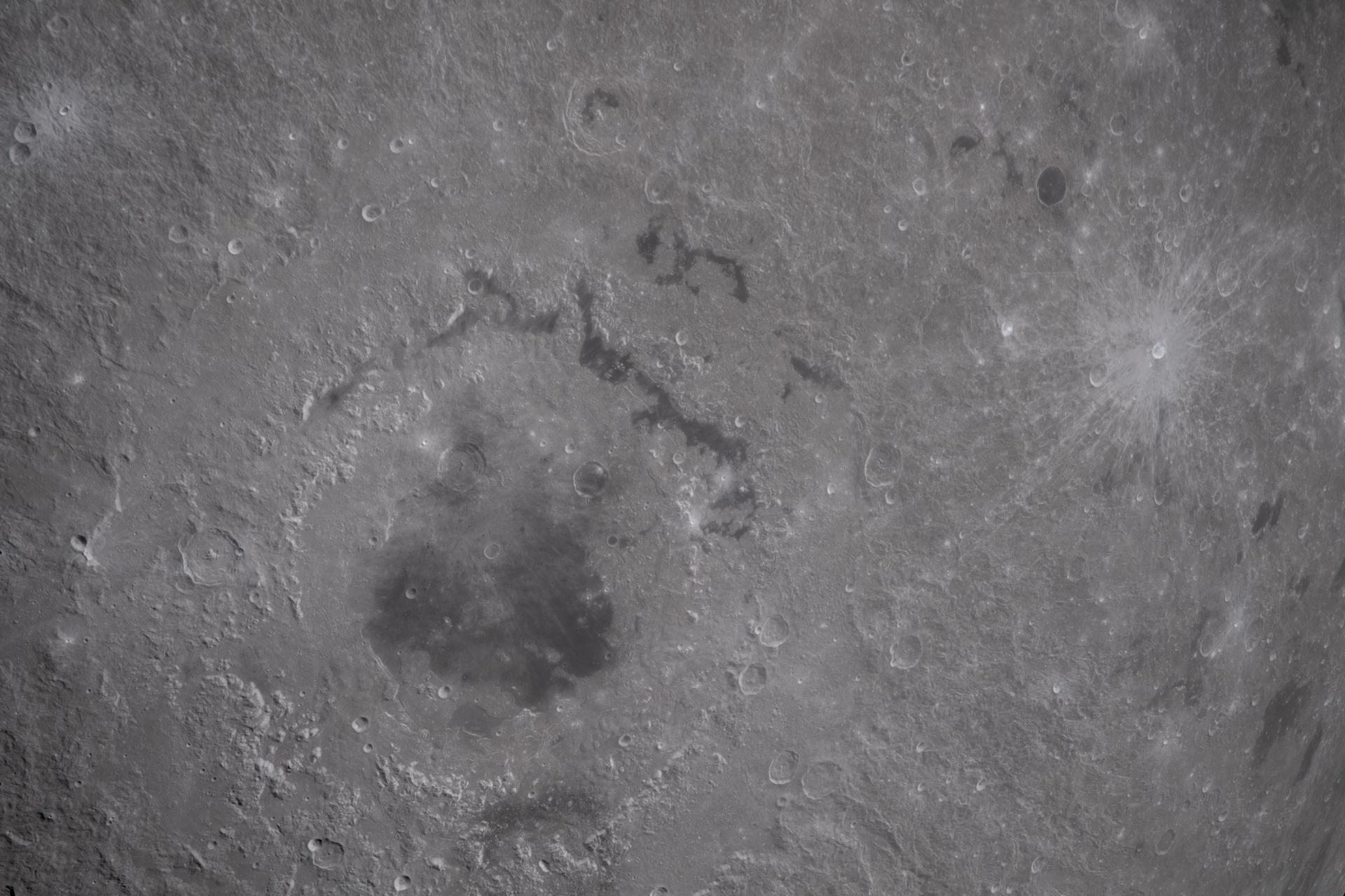 The Orientale Basin on the Moon, showing its distinctive concentric ring structure — rings of mountains surrounding a central dark patch of ancient volcanic rock
