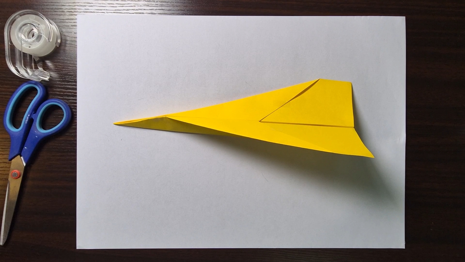 Folded paper airplane, flyer design